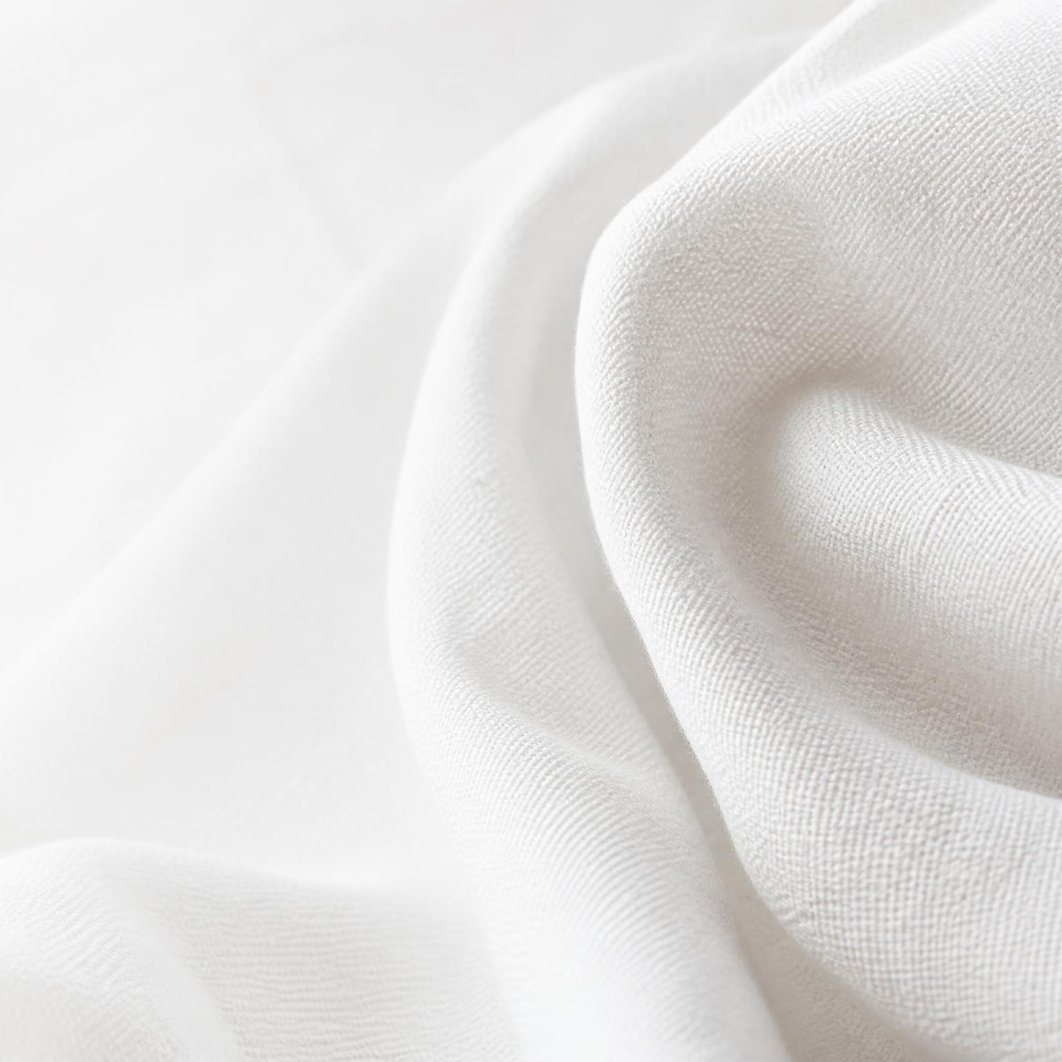 Macro detail of white woven textile